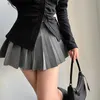 Rokken houzhou geplooide rok met shorts vrouwen sexy hoge taille onregelmatige witte zwarte A-lijn gyaru tennis mini rok school L231222