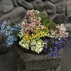 Decoratieve bloemen kunstmatige planten bruid vasthouden en pruimen huizentuin decoreren