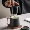 Tazas Cerámica Simplicidad moderna Taza de té doméstica Gran capacidad Manja de madera maciza Topas de separación de té con tapa y filtración