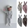 ズボンの赤ちゃん秋と冬の綿のハイウエストベリー保護ストラップパンツ幼児用ジャンプスーツ