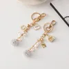 Keychains Fashion Rhinestone Ball Bow Cute Keychain Mini Handväska Pearl Chain Metal Keyring Women Gift Jewelry Bag Car Pendant Accessories