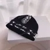 Nuovo designer di fiori incrociati Capitellini cromati cromati cuori cappelli beanie designer uomini donne cappello di lana in lana cappello di lana casual elastico elastico berretto bernello ch warm hat g1