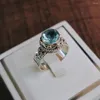 Cluster anneaux Style Luxury Couleur en argent imitation Rotundit Blue Topaz Open Ring pour femmes Fashion Modèle Unique Bijoux de motif polyvalent