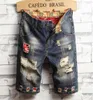 Unique Mens Ripped Denim Shorts Vintage Fashion Designer Washed Knee Length Jeans 2019 Scratched Hip Hop Short pants Trousers 7829211908