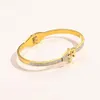 Braccialetti con marchio designer Women Bangle Luxury Designer Lettera Bracciale Crystal 18K Gold in acciaio inossidabile Americi per matrimoni GIF2044