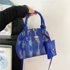 Borsa da donna portatile alla moda con texture luminosa con tela coccodrillo sacca con shell nuova borsa a traversa versatile occidentale