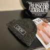 Beanie/Kafatası Kapakları Tasarımcı Erkek Yün Şapka Sonbahar ve Kış Boş Zamanlı Çok Yönlü Örme Şapka Markası Gevşek ve Sıcak Açık Soğuk Şapkalar Kadın Moda