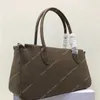 2024 Kobiety moda luksusowe torby na torebkę z marką rączki z pieniędzmi projektantka damska krowica oryginalna skórzana torebki 10a