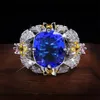 Choucong New Sparkling Luxury Jewelry 925 SER un argent sterling multicolon Blue Sapphire CZ Diamond Gemstones Flower Women Wedding Band274X