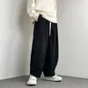 Pantalon pour hommes décontracté harajuku couleur solide japonais en velours côtelé des pieds attachés et de taille lâche de travail simple de travail simple