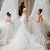 Abiti da ragazza di fiore in pizzo tulle bianco champagne maniche lunghe abiti da cerimonia per occasioni formali trasparenti con o-collo per bambini Abito da prima comunione per compleanno matrimonio CL3106