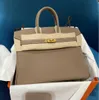 70 % Factory-Outlet-Rabatt auf Rindsleder mit Litschimuster für Damen mit Handgepäcktasche im Angebot