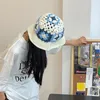 2023 Fleur Crochet Bucket Hat Femme Printemps Été Bons de tricot fait à la main Ins coréen mignon Panama Cap 231222