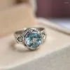 Cluster anneaux Style Luxury Couleur en argent imitation Rotundit Blue Topaz Open Ring pour femmes Fashion Modèle Unique Bijoux de motif polyvalent