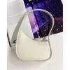 Mini The Cowhide Totes Wallte Luxury Moon-formade lager underarmiga damer Handväska Märke LCU Half Moon Top Luxury Bags