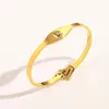 Braccialetti con marchio designer Women Bangle Luxury Designer Lettera Bracciale Crystal 18K Gold in acciaio inossidabile Americi per matrimoni GIF2044