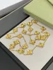 قلادة المصممين 20 زهور أربع أوراق البرسيم قلادة قلادة أعلى جودة جودة الذهب سلسلة مصمم كلاسيكي للنساء مجوهرات الزفاف مع صندوق
