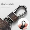 Luxurys coin purse car Keychains metal buckle letter printing fashion PU leather Pendant cars keyring chain Brown flower mini bag trinket gift for men women Lanyards