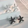 Boucles d'oreilles Yixin Shinny Star Cubic Zirconia pour femmes étoiles de mer noires Bridge Bridal Korea Wedding Party Bijoux