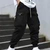 Pantaloni maschili più tasche da tasca cargo streetwear con elastico in vita multiplo per salto traspirante