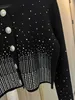 Camisa de punto de diamante de industria pesada negra, cárdigan delgado con hombros en ángulo recto, hombrera de estilo occidental de gama alta para el hogar, otoño 2024