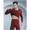 Uomini biancheria bianche da uomo Slip sexy soft autunno inverno maniche lunghe fino a fondo calda senza cucitura maschio 2 pezzi da sonno 2024