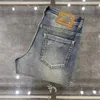 Designer Luxury maschi maschili Stampato lettera triangolare retrò nuovi jeans sciolte elasticità dritta usura pantaloni casual sport resistenti