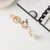 Keychains Fashion Rhinestone Ball Bow Cute Keychain Mini Handväska Pearl Chain Metal Keyring Women Gift Jewelry Bag Car Pendant Accessories