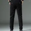 Pantalon masculin confortable pantalon hommes épais hiver illimité au vent chaud avec la jambe droite ajustement en vrac moyen pour la couleur du solide d'automne