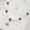 Pendant Necklaces Fashionable Emerald Heart-shaped Butterfly Necklace With Matte Finish - Gold-plated Green Gemstones