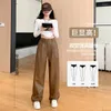 Pantalon féminin Maillard Coffee Pu Cuir Costume pour les femmes automne / hiver 2023 taille haute couture étroite coupé brun jambe large