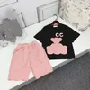 Kids Fashion Designer Kleidung Mädchen Designer Rock o Halshemd Set Baby Kleidung Kinder Tracksaner Vollbuchstaben Kid Top Tees und Röcke