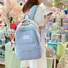 Ryggsäck Fashion Canvas Teenage Harajuku Applique Ryggsäckar Kawaii Kvinnlig nylon Studentbok Casual Bag