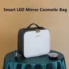 Kosmetiska väskor 2024 Smart LED -sminkväska med spegel stor kapacitet Professionell vattentät pu läderresor för kvinnor
