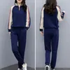 Pantalon de deux pièces pour femmes Élastique à la taille large ensemble de jambes de la jambe confortable avec un collier de décoration de fermeture à glissière assorti