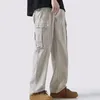 Pantalon pour hommes coutures de poche renforcées de couleur de couleur une plus grande jambe rétro large avec des poches multiples pour hommes pantalon de streetwear respirant