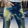 Dżinsy męskie 2024 Męskie Elastyczna złamana dziura Malowana motocyklista Jean Fashion Street Slim Fit Denim Motorcycle Pants Men Punk Prosto