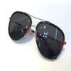 Occhiali da sole di design di lusso per donne 0062 classici occhiali in metallo in metallo in stile moda estiva