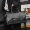 Sacs bouffés 2024 Classics Hommes voyage Duffle Sac Fashion Cuir en cuir noir Sac à main rond