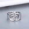 Дизайнерское кольцо мужское кольцо кольцо кольцо кольца обручальные кольца для женщин для женщин с бриллиантовым кольцом, усеянным титановым стальным классическим золотым и серебряными розами.