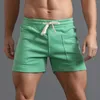 Pantaloncini da uomo Summer Summer Solid Color Big Tast Pants Pockedstring Sports Casual Sports Running Straight Beach Basketball