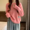 女性用セーター春秋のプルオーバーソリッドカラークルーネックスクリュースレッドルーズファッション甘い長袖トップス