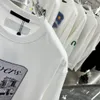 23SS Tasarımcı Mektup Baskı Tişörtleri Tee Sweatshirt Moda Yüksek Sokak Kısa Kollu Yaz Günlük Tişört Nefes Alabilir Erkekler Kadın Mürettebat Boyun Tees Elbiseleri Wo 12-310