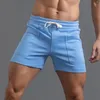 Pantaloncini da uomo Summer Summer Solid Color Big Tast Pants Pockedstring Sports Casual Sports Running Straight Beach Basketball