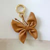 Llavero de mariposa de cuero PU lindos colgantes de animales creativos anillo de llave mujeres bolsas de chicas mochilas accesorios autos decoración llave regalo