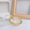 Braccialetti con marchio designer di alto livello Women Bangle Bangle Designer Lettera Bracciale Crystal 18K Gold in acciaio inossidabile Americi per matrimoni 260K 260K