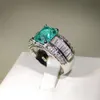 Choucong Brand Anneaux de mariage Bijoux de luxe 925 argent sterling remplissage Radiant Cut Emerald CZ Diamond Gemstones Party Women Eternity283X