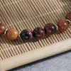 Strand Oaiite 8 mm Natural Yellow Tiger Eye Bracelet Chakra Wood Perle pour hommes et femmes Meditation de yoga Méditation Alulette Energy Stone