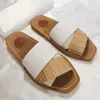 Designer Woody Flat Mule Vrouwen Slippers Glijden Sandalen zeil canvas zwart witte olijf beige rood mesh borduurwerk in reliëfvolte roze strandschoenen sandalen maat 35-42