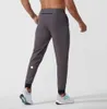 Lulu Men calça o equipamento de ioga longjogger esporte rápido ginásio de ginástica seco de ginástica calça calça calça mensual elástico elástico fitness man D99